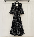 Robe MARIA noir à pois blancs sur cintre – tenue de flamenco
